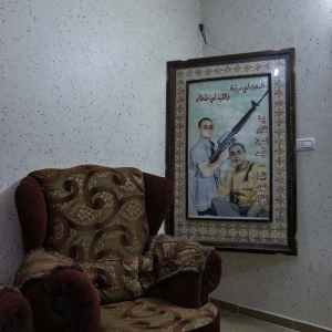 25 January 2015 – A portrait of Atta Abdelgami hangs in his house in Tulkarm, Palestine. Abdelgami is serving a life sentence. He and his wife Rula Ali Ahmed have two children who were conceived using IVF. Portraits are seen not only as mementos of imprisoned men, but also as a means of bringing new generations closer to the resistance.