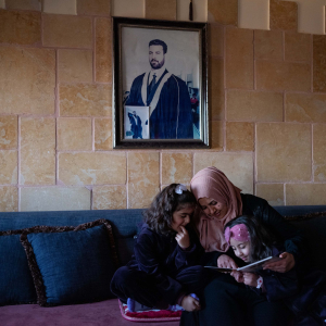18 December 2019 – Hanadi Moussa Moghrabi sits with her twins, Nour and Sondus, born following IVF, in their home in Bethlehem, Palestine. Her husband Ahmed was arrested in 2002 during the Second Intifada on charges of being the local head of Al-Aqsa Martyrs Brigades, and is serving a number of life sentences.