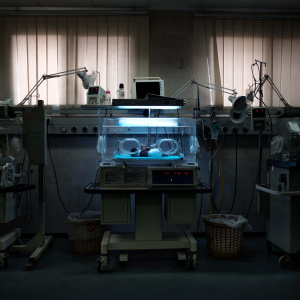 18 January 2015 – A baby born a few hours earlier lies inside an incubator at Al-Shifa Hospital, Gaza.