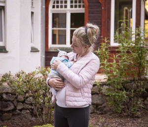 4 July 2020 – Kamila Wozniak, who is pregnant with her second child, cradles her reborn doll, in Karpacz, Poland.