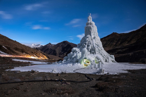 19 March 2019 – The youth group that built this ice stupa in the village of Gya installed a café in its base. They used the proceeds to take the village elders on a pilgrimage.
