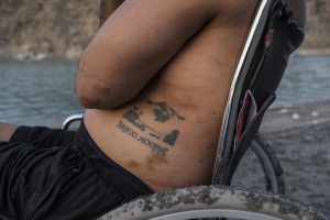 9 September 2020 – Saeed has the image of a traceur tattooed on his side, with Farsi slang for ‘to be continued’, Gachsaran, Iran.