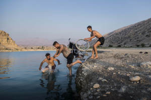 9 September 2020 – Saeed enjoys time with friends at Kosar Dam Lake, near Gachsaran, Iran.
