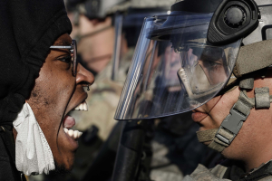 29 May 2020 – A protester and a National Guardsman face off on East Lake Street, Minneapolis, Minnesota, USA, during a demonstration decrying the death of George Floyd while in Minneapolis Police custody. On 29 May, the National Guard tweeted that they had deployed 500 soldiers to Minneapolis, St Paul, and surrounding communities. Ultimately, 7,123 personnel were called into service, Minnesota National Guard’s largest deployment since the Second World War.
