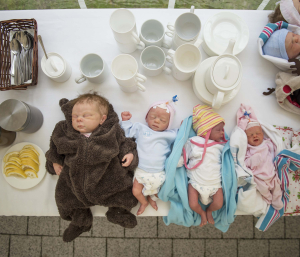 10 May 2019 – Reborn dolls lie on a table at a doll-owners’ get-together, in Olesnica, Poland. The owners exchange baby clothes, take walks and have meals together.