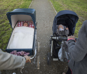 11 May 2019 – Mothers take a walk with their children, in Olesnica. Poland. One of the babies is real and one is a doll.
