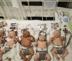 22 February 2015 – Reborn dolls lie set out for ‘adoption’, at a doll fair at the Brentwood Holiday Inn, Brentwood, UK.