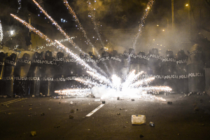 14 November 2020 – A barrage of fireworks is launched against police trying to prevent protesters from marching on the Peruvian Congress building, in Lima, Peru.