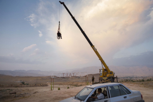 11 September 2020 – Saeed enjoys being hoisted high by a crane, while sitting in a wheelchair, at the Gachsaran Motorcycle Track, Gachsaran, Iran.