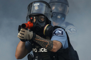 29 May 2020 – Police fire tear gas on demonstrators at the intersection of East Lake Street and Hiawatha Avenue in St Paul, Minnesota, USA, near the precinct station of the officers who arrested George Floyd.